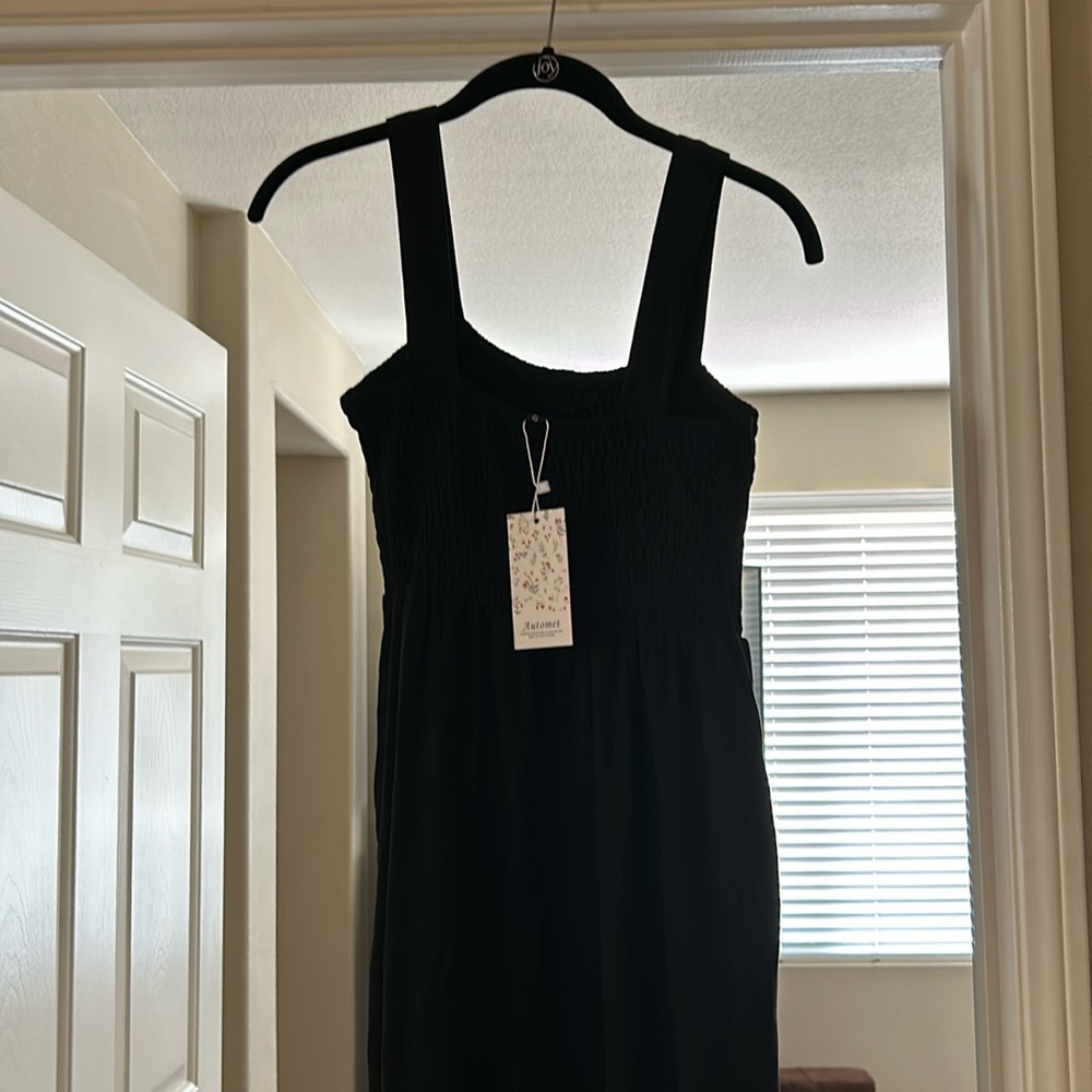 Black romper size small new with tags